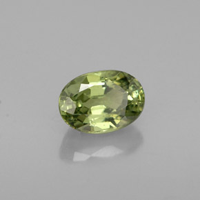 0.77 ct Green Demantoid Garnet Stone, Natural Demantoid Garnet in Oval Facet Shape for Sale