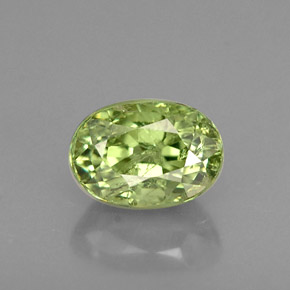 0.80 ct Green Demantoid Garnet Gemstone, Demantoid Garnet Gem in Oval Facet Shape for Sale.