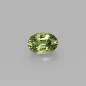 0.67 ct Green Demantoid Garnet Gemstone, Demantoid Garnet Gem in Oval Facet Shape for Sale.