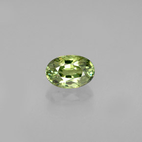 0.56 ct Green Demantoid Garnet Gemstone, Demantoid Garnet Gem in Oval Facet Shape for Sale.