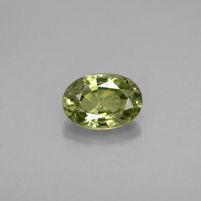 0.53 ct Green Demantoid Garnet Gemstone, Demantoid Garnet Gem in Oval Facet Shape for Sale.
