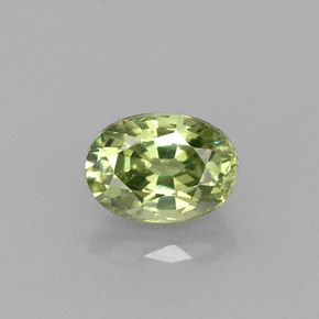 0.72 ct Green Demantoid Garnet Gemstone, Demantoid Garnet Gem in Oval Facet Shape for Sale.