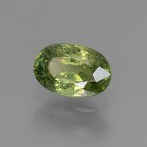 0.66 ct Green Demantoid Garnet Stone, Natural Demantoid Garnet in Oval Facet Shape for Sale