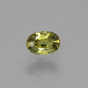 0.64 ct Green Demantoid Garnet Gemstone, Demantoid Garnet Gem in Oval Facet Shape for Sale.