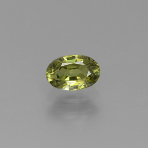 0.59 ct Green Demantoid Garnet Gemstone, Demantoid Garnet Gem in Oval Facet Shape for Sale.