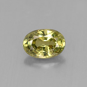 0.66 ct Green Demantoid Garnet Gemstone, Demantoid Garnet Gem in Oval Facet Shape for Sale.