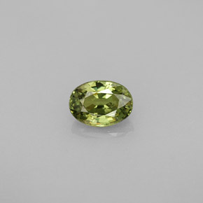 0.67 ct Green Demantoid Garnet Gemstone, Demantoid Garnet Gem in Oval Facet Shape for Sale.