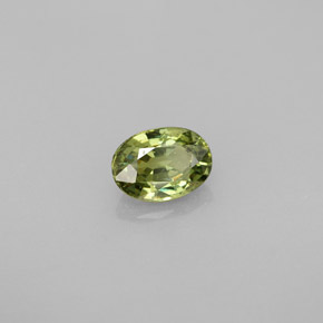 0.67 ct Green Demantoid Garnet Stone, Natural Demantoid Garnet in Oval Facet Shape for Sale