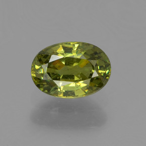0.67 ct Green Demantoid Garnet Gemstone, Demantoid Garnet Gem in Oval Facet Shape for Sale.