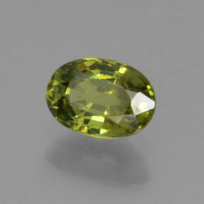 0.67 ct Green Demantoid Garnet Stone, Natural Demantoid Garnet in Oval Facet Shape for Sale