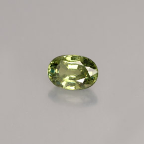 0.68 ct Green Demantoid Garnet Stone, Natural Demantoid Garnet in Oval Facet Shape for Sale