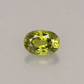 0.63 ct Green Demantoid Garnet Gemstone, Demantoid Garnet Gem in Oval Facet Shape for Sale.