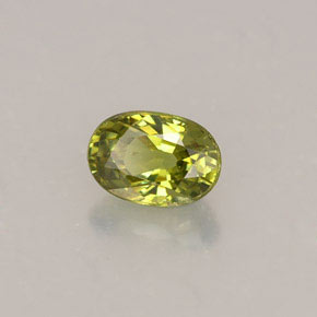 0.63 ct Green Demantoid Garnet Stone, Natural Demantoid Garnet in Oval Facet Shape for Sale