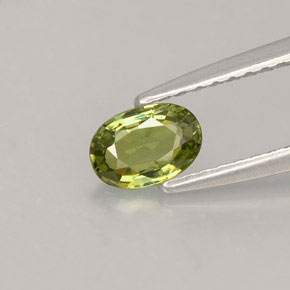 0.45 ct Green Demantoid Garnet Gemstone, Demantoid Garnet Gem in Oval Facet Shape for Sale.