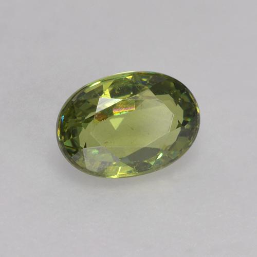 0.64 ct Green Demantoid Garnet Stone, Natural Demantoid Garnet in Oval Facet Shape for Sale