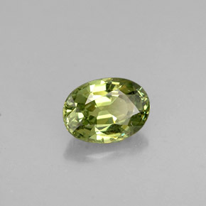 0.62 ct Green Demantoid Garnet Gemstone, Demantoid Garnet Gem in Oval Facet Shape for Sale.