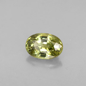 0.63 ct Green Demantoid Garnet Stone, Natural Demantoid Garnet in Oval Facet Shape for Sale