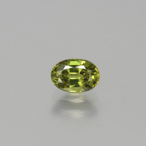 0.71 ct Green Demantoid Garnet Gemstone, Demantoid Garnet Gem in Oval Facet Shape for Sale.