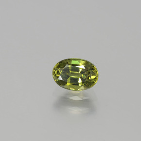 0.71 ct Green Demantoid Garnet Stone, Natural Demantoid Garnet in Oval Facet Shape for Sale