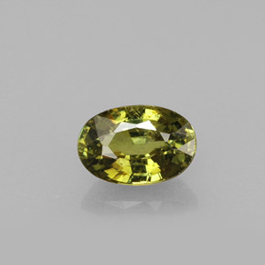 0.65 ct Yellow Demantoid Garnet Gemstone, Demantoid Garnet Gem in Oval Facet Shape for Sale.