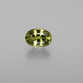 0.72 ct Green Demantoid Garnet Gemstone, Demantoid Garnet Gem in Oval Facet Shape for Sale.