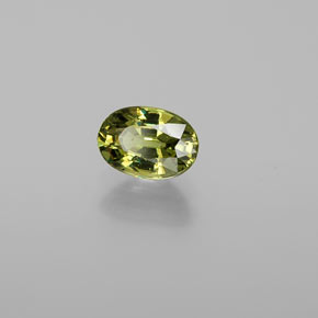 0.72 ct Green Demantoid Garnet Stone, Natural Demantoid Garnet in Oval Facet Shape for Sale