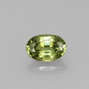0.71 ct Green Demantoid Garnet Gemstone, Demantoid Garnet Gem in Oval Facet Shape for Sale.