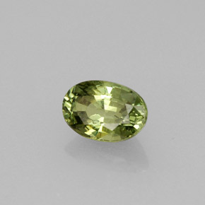 0.71 ct Green Demantoid Garnet Stone, Natural Demantoid Garnet in Oval Facet Shape for Sale