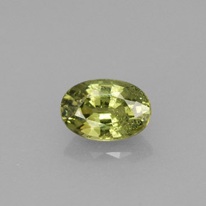 0.58 ct Green Demantoid Garnet Gemstone, Demantoid Garnet Gem in Oval Facet Shape for Sale.
