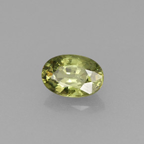 0.58 ct Green Demantoid Garnet Stone, Natural Demantoid Garnet in Oval Facet Shape for Sale