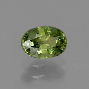 0.68 ct Green Demantoid Garnet Stone, Natural Demantoid Garnet in Oval Facet Shape for Sale