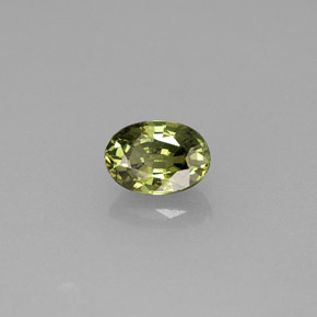 0.74 ct Green Demantoid Garnet Gemstone, Demantoid Garnet Gem in Oval Facet Shape for Sale.