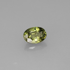 0.74 ct Green Demantoid Garnet Stone, Natural Demantoid Garnet in Oval Facet Shape for Sale