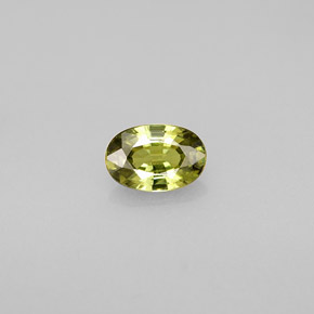 0.59 ct Green Demantoid Garnet Gemstone, Demantoid Garnet Gem in Oval Facet Shape for Sale.