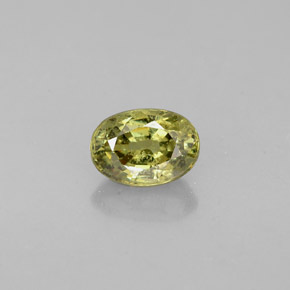 0.71 ct Green Demantoid Garnet Gemstone, Demantoid Garnet Gem in Oval Facet Shape for Sale.