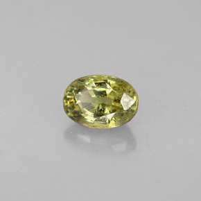 0.71 ct Green Demantoid Garnet Stone, Natural Demantoid Garnet in Oval Facet Shape for Sale