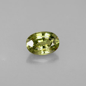 0.66 ct Green Demantoid Garnet Gemstone, Demantoid Garnet Gem in Oval Facet Shape for Sale.