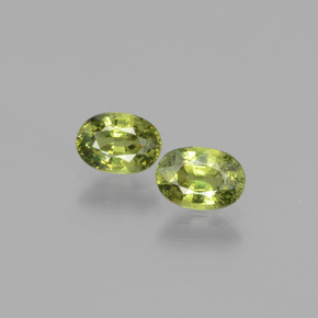 1.28 ctw Green Demantoid Garnet Gemstones, Demantoid Garnet Gems in Oval Facet Shape for Sale.