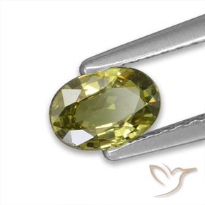 0.57 ct Green Demantoid Garnet Stone, Natural Demantoid Garnet in Oval Facet Shape for Sale