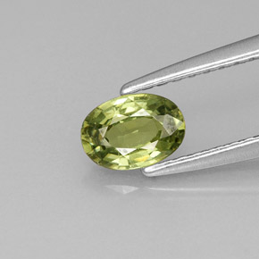 0.53 ct Green Demantoid Garnet Gemstone, Demantoid Garnet Gem in Oval Facet Shape for Sale.