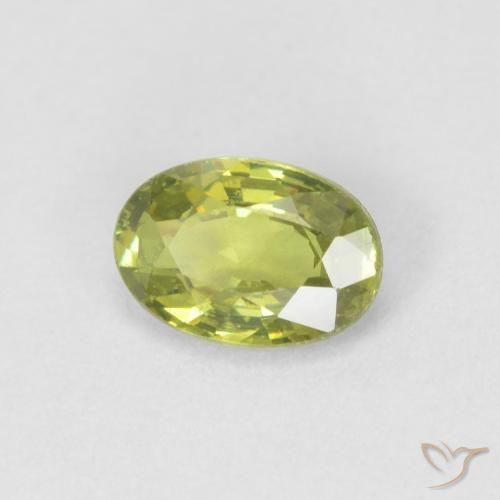 0.55 ct Green Demantoid Garnet Stone, Natural Demantoid Garnet in Oval Facet Shape for Sale