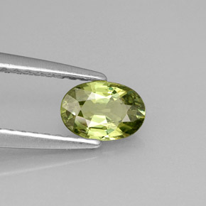 0.59 ct Green Demantoid Garnet Stone, Natural Demantoid Garnet in Oval Facet Shape for Sale