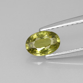 0.57 ct Green Demantoid Garnet Gemstone, Demantoid Garnet Gem in Oval Facet Shape for Sale.