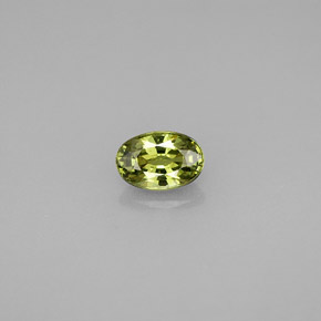0.65 ct Green Demantoid Garnet Gemstone, Demantoid Garnet Gem in Oval Facet Shape for Sale.