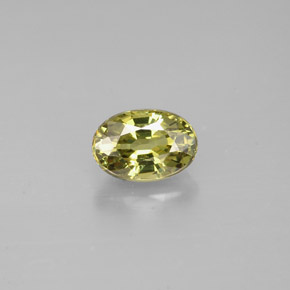 0.71 ct Green Demantoid Garnet Gemstone, Demantoid Garnet Gem in Oval Facet Shape for Sale.