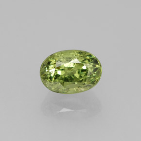 0.80 ct Green Demantoid Garnet Gemstone, Demantoid Garnet Gem in Oval Facet Shape for Sale.