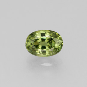 0.72 ct Green Demantoid Garnet Gemstone, Demantoid Garnet Gem in Oval Facet Shape for Sale.