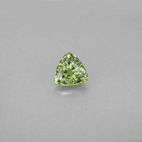 0.77 ct Green Demantoid Garnet Gemstone, Demantoid Garnet Gem in Trillion Facet Shape for Sale.