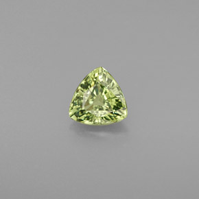 0.68 ct Green Demantoid Garnet Gemstone, Demantoid Garnet Gem in Trillion Facet Shape for Sale.