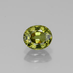 0.88 ct Green Demantoid Garnet Gemstone, Demantoid Garnet Gem in Oval Facet Shape for Sale.